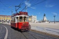 Red tram on a square Praca de Comercio in Lisbon, Portugal Royalty Free Stock Photo